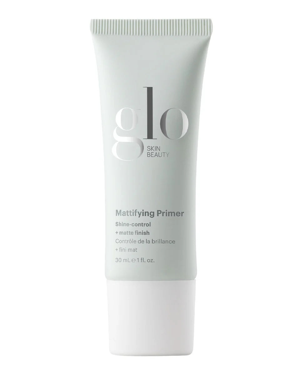 Tube des Glo Skin Beauty Mattifying Primers – glanzkontrollierender Primer mit mattem Finish, 30 mL (1 fl. oz.)