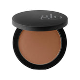Kompakter Bronzer mit schwarzem Deckel im matten Farbton Cocoa Light, Deckel beschriftet mit Glo Skin Beauty