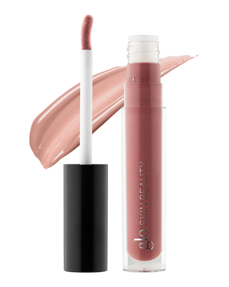Glo Skin Beauty Secret Agent Glitter Lipgloss mit Doe-Foot-Applikator und passendem Farb-Swatch.