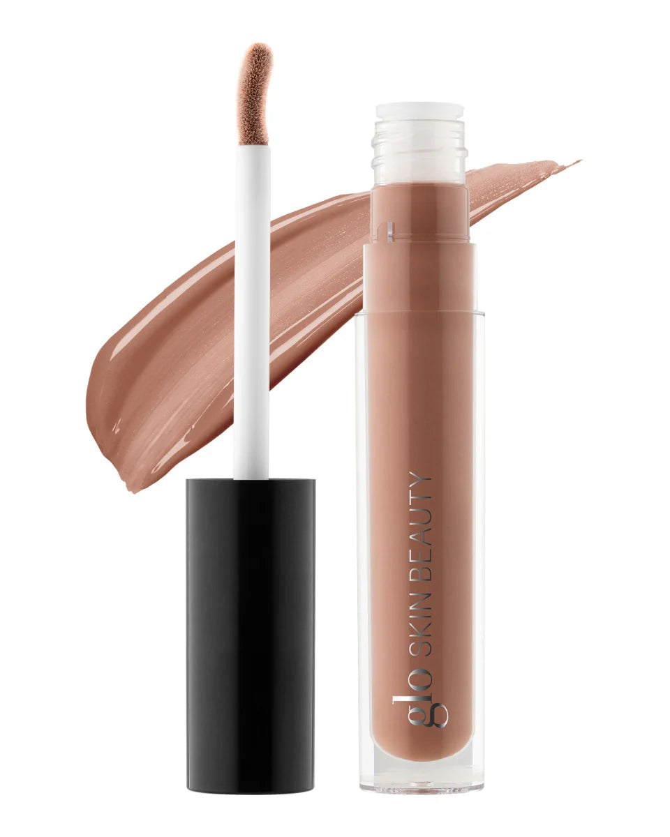 Glo Skin Beauty Skinny Dip Glitter Lipgloss mit Doe-Foot-Applikator und passendem Farb-Swatch.