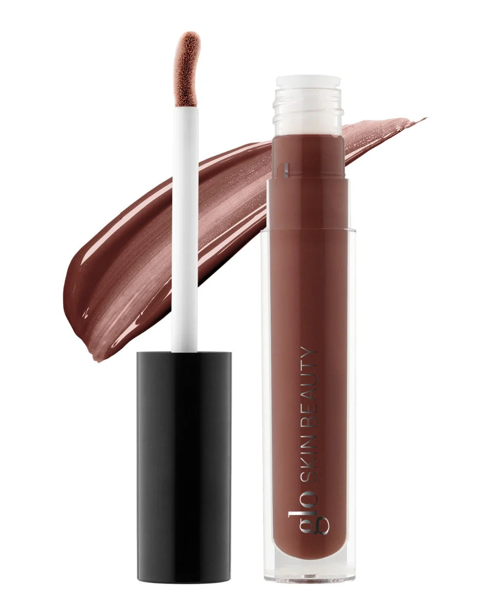 Glo Skin Beauty Speakeasy Glitter Lipgloss mit Doe-Foot-Applikator und passendem Farb-Swatch.