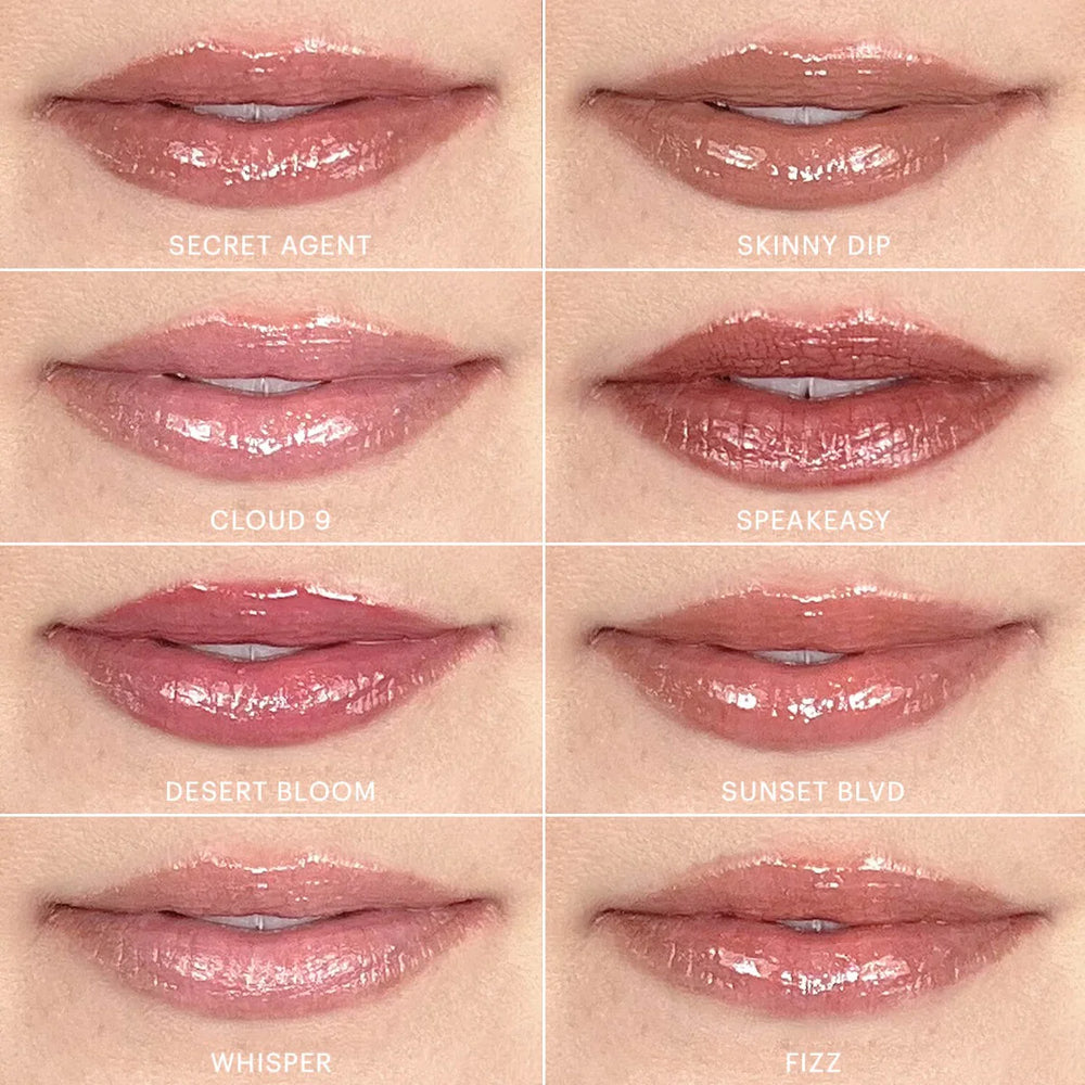 Acht Lipgloss-Farbtöne auf den Lippen aufgetragen: Secret Agent, Skinny Dip, Cloud 9, Speakeasy, Desert Bloom, Sunset Blvd, Whisper und Fizz.