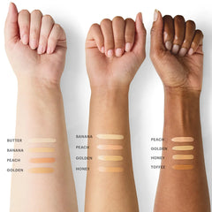 Drei Unterarme (hell, mittel, dunkel) mit Foundation-Swatches, beschriftet mit Butter, Banana, Peach, Golden, Honey, Toffee